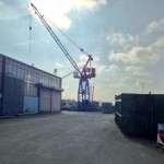 We are now located on a shipyard site at the Kiel Fjord, in the middle of drydocks, cranes and yelling seagulls. 